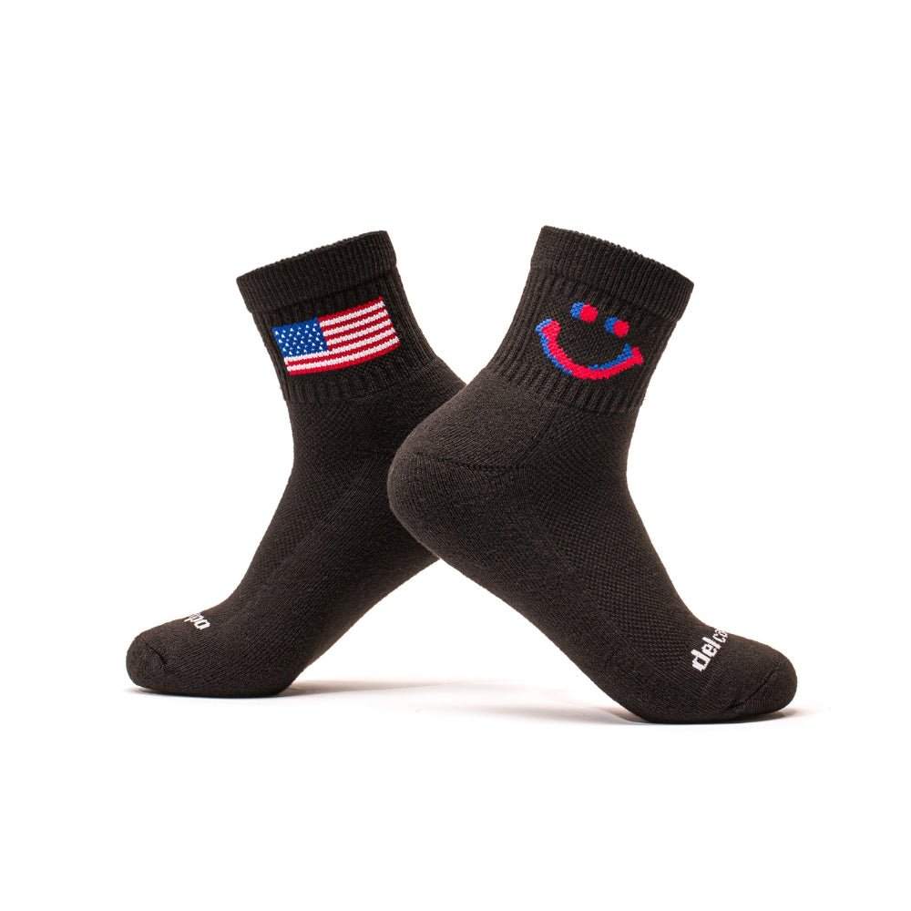 Del Campo Night Mode Pack golf socks featuring all four Night Mode designs: bolt, palm, smiley, and 1776