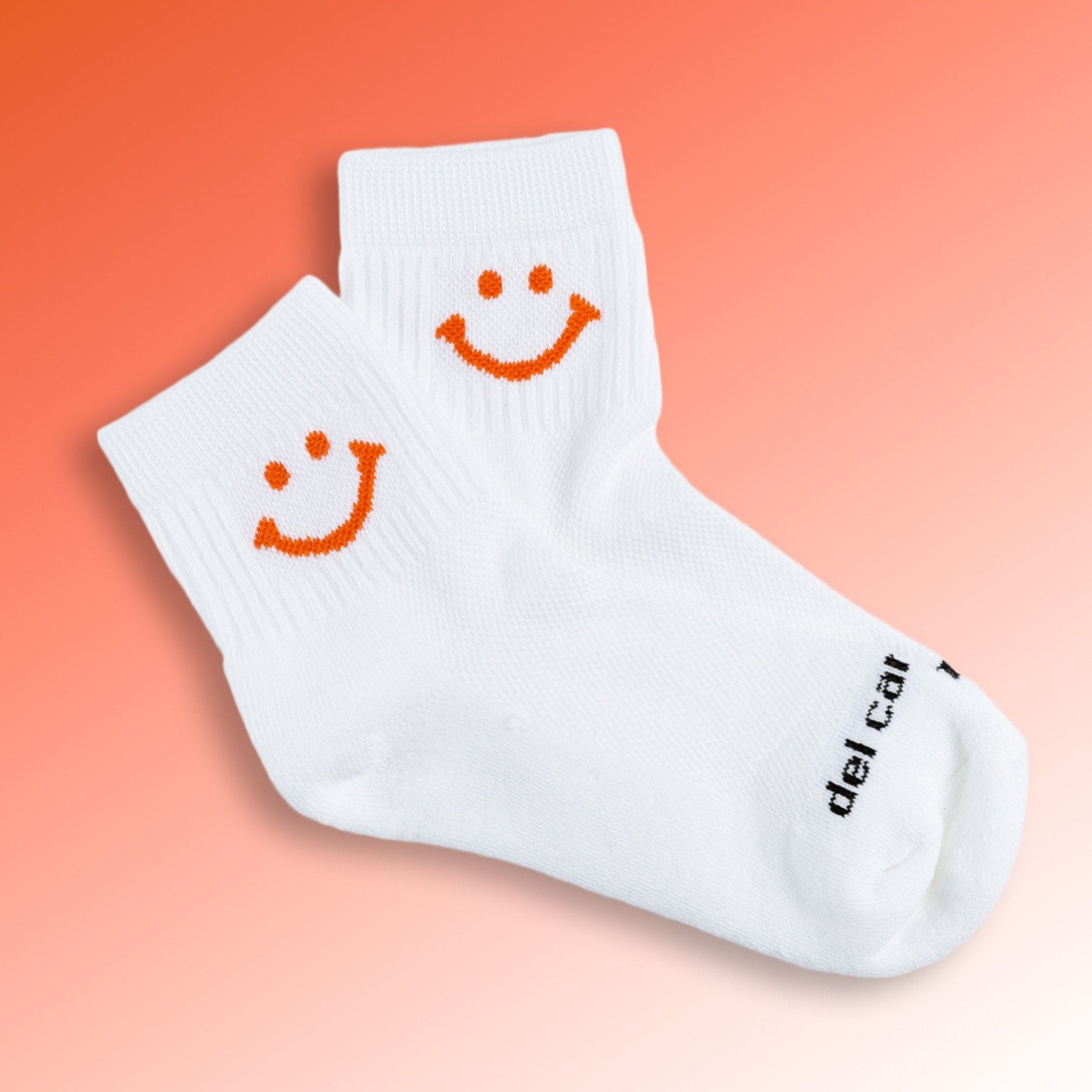 Del Campo Orange Smiley golf socks