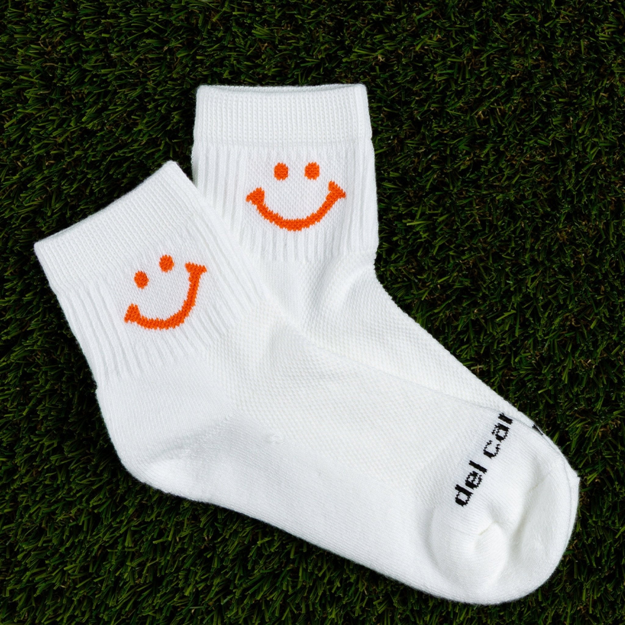 Del Campo Orange Smiley golf socks