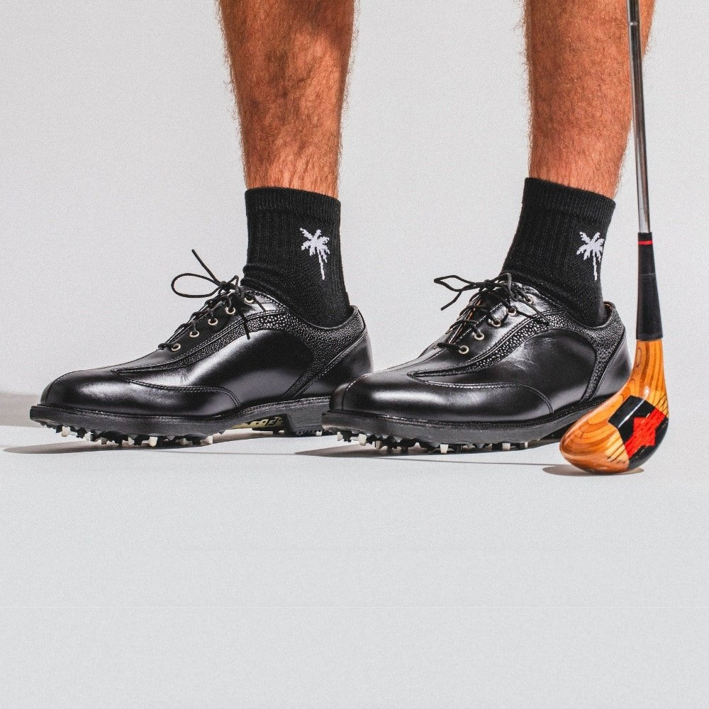 Del Campo Night Mode Pack golf socks featuring all four Night Mode designs: bolt, palm, smiley, and 1776