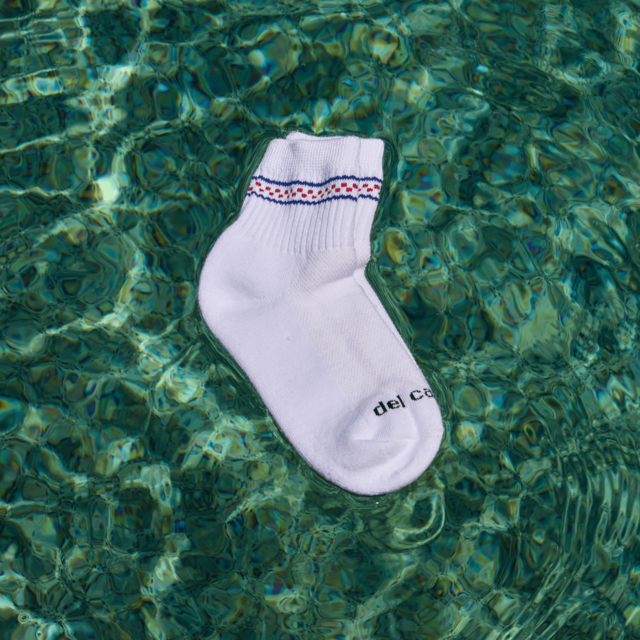 Del Campo Blue/Red Checkered Stripes golf socks, lifestyle shot