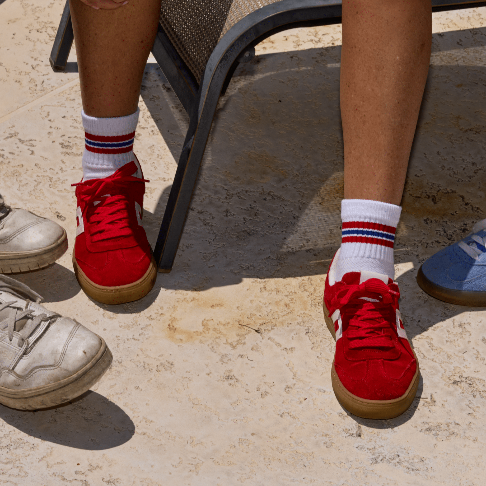 Del Campo Red/Blue Triple Stripe golf socks, lifestyle shot