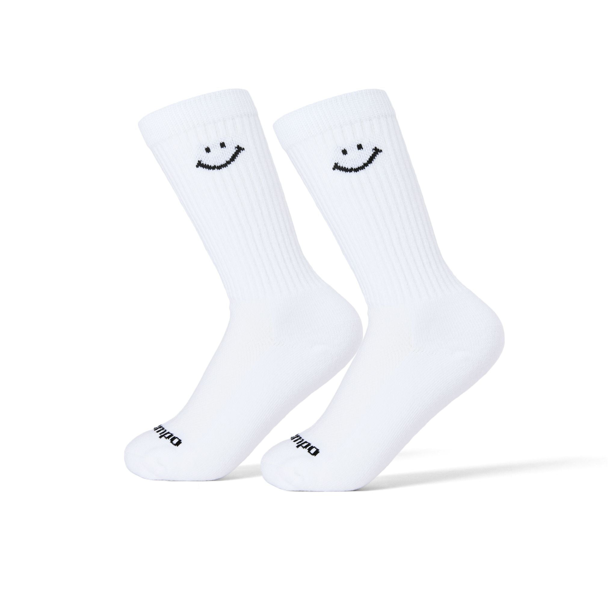 White Smiley Crew golf socks with black smiley face design on calf. | product