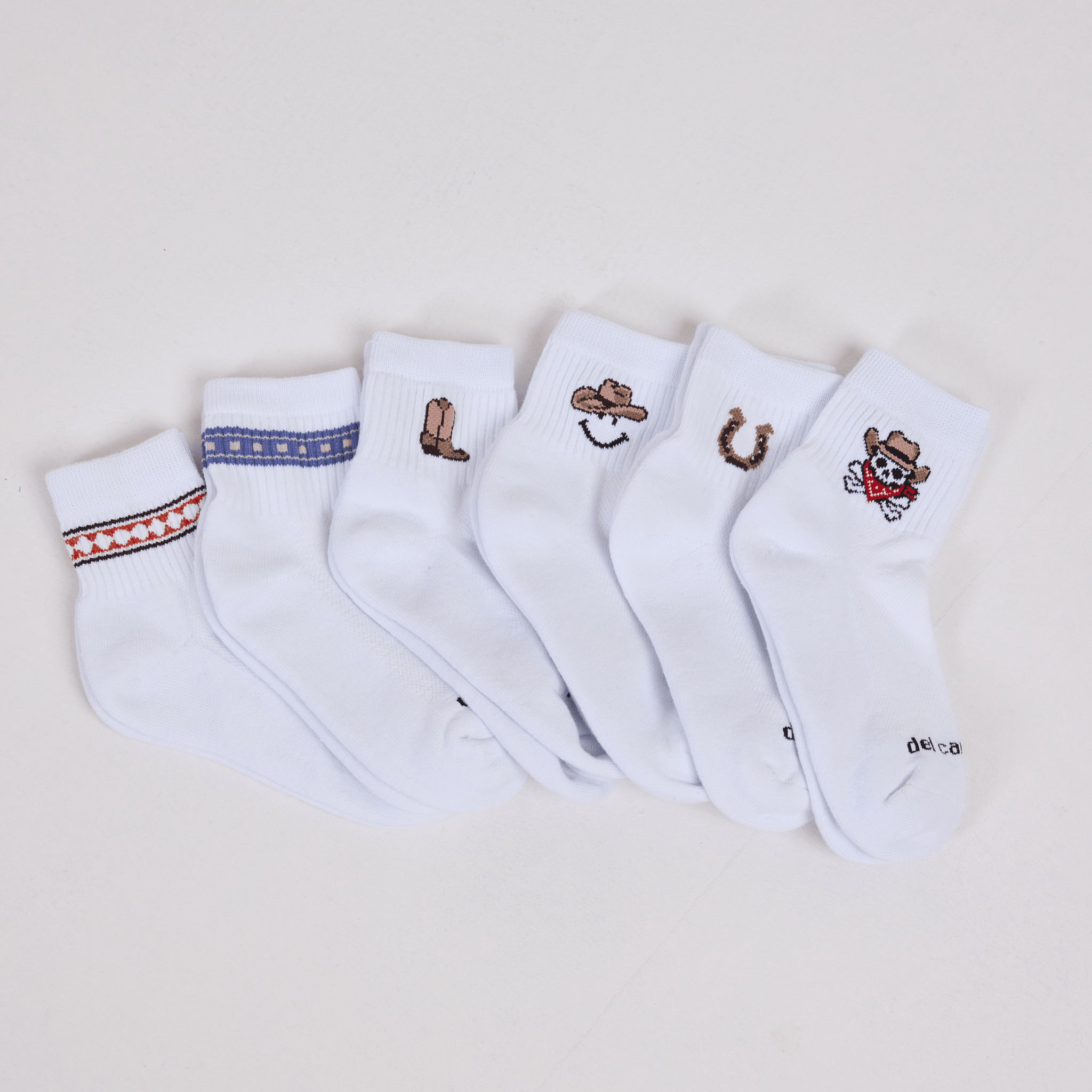 Del Campo Western Pack - all six western sock designs fanned out in a row on a white background.