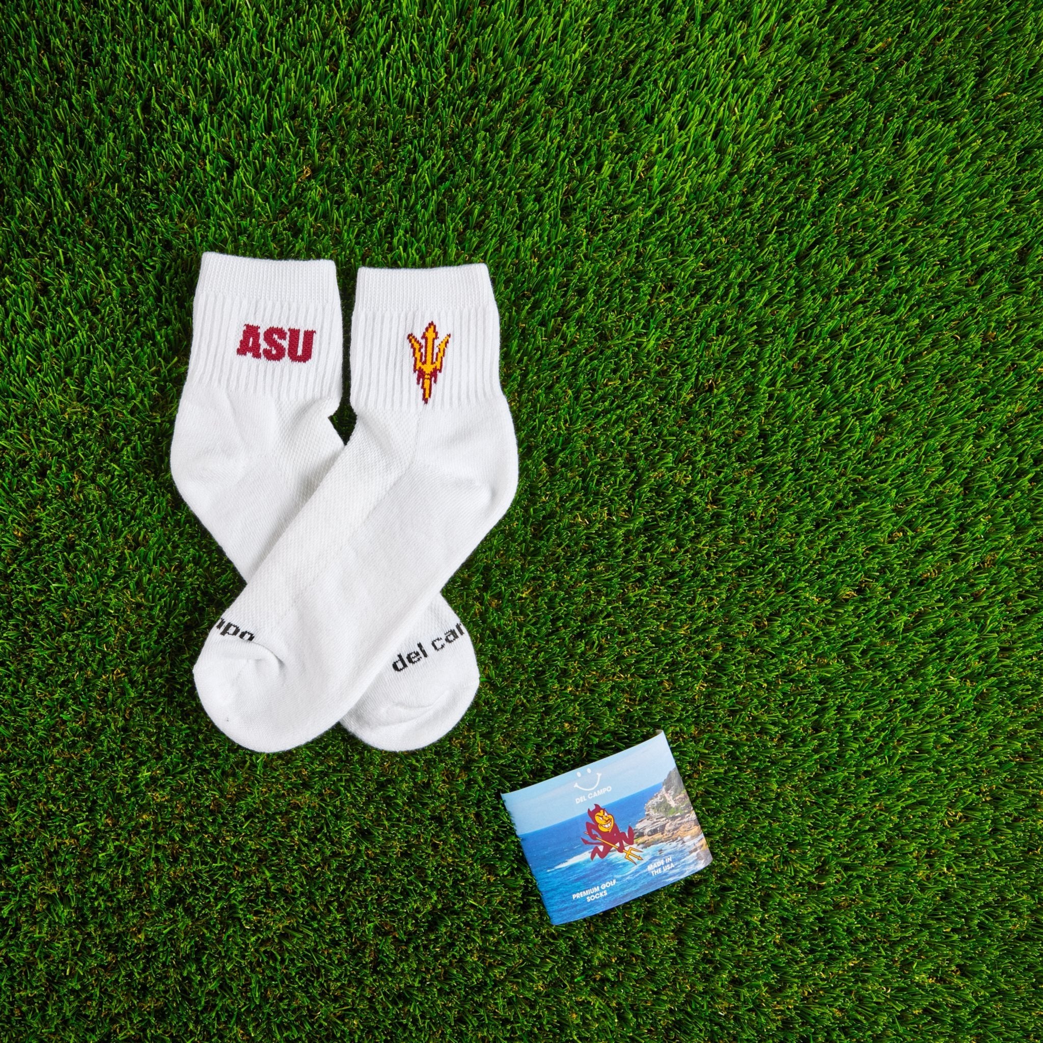 Del Campo Arizona State Sun Devils golf socks on turf with a team pennant