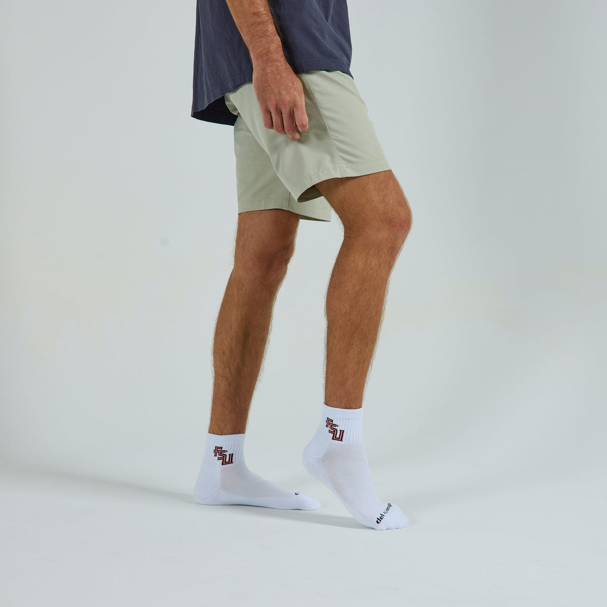 Del Campo Florida State Script golf socks on a male model in studio