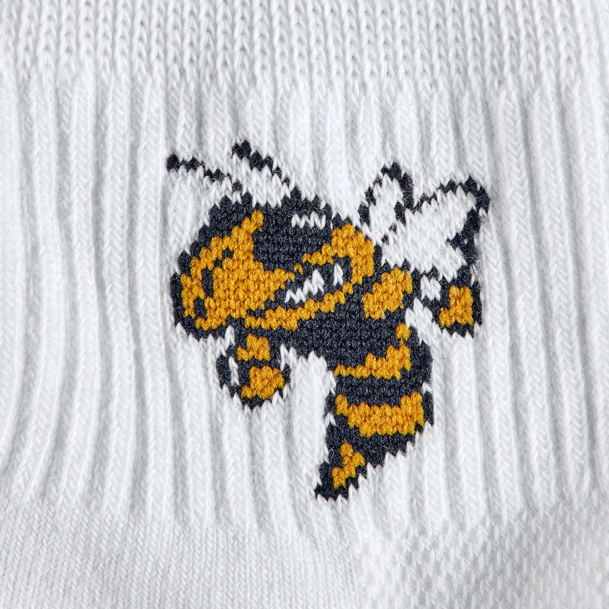 Close-up of the Buzz the yellowjacket mascot on Del Campo Georgia Tech Buzz golf socks