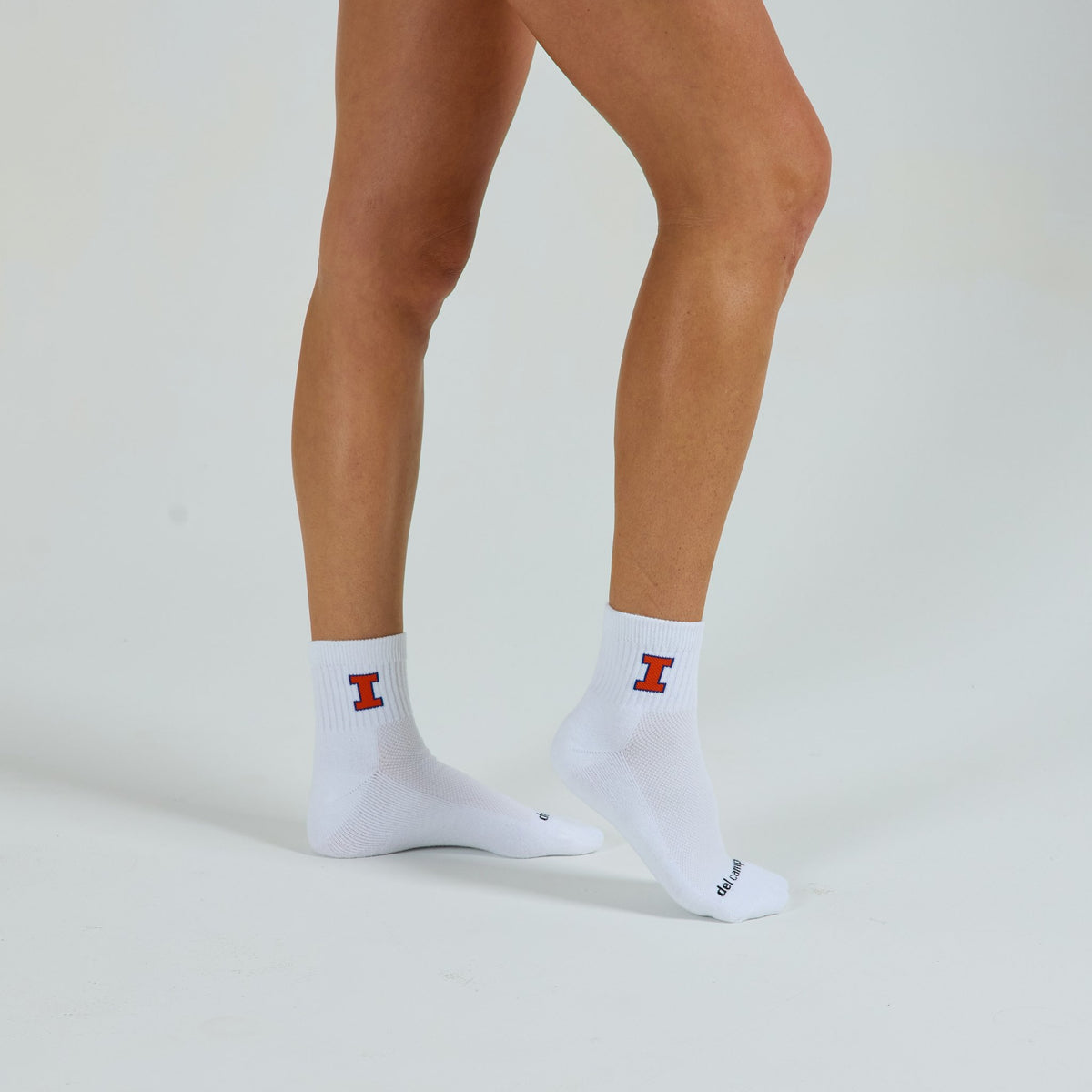 Del Campo Illinois Fighting Illini golf socks on a female model in studio
