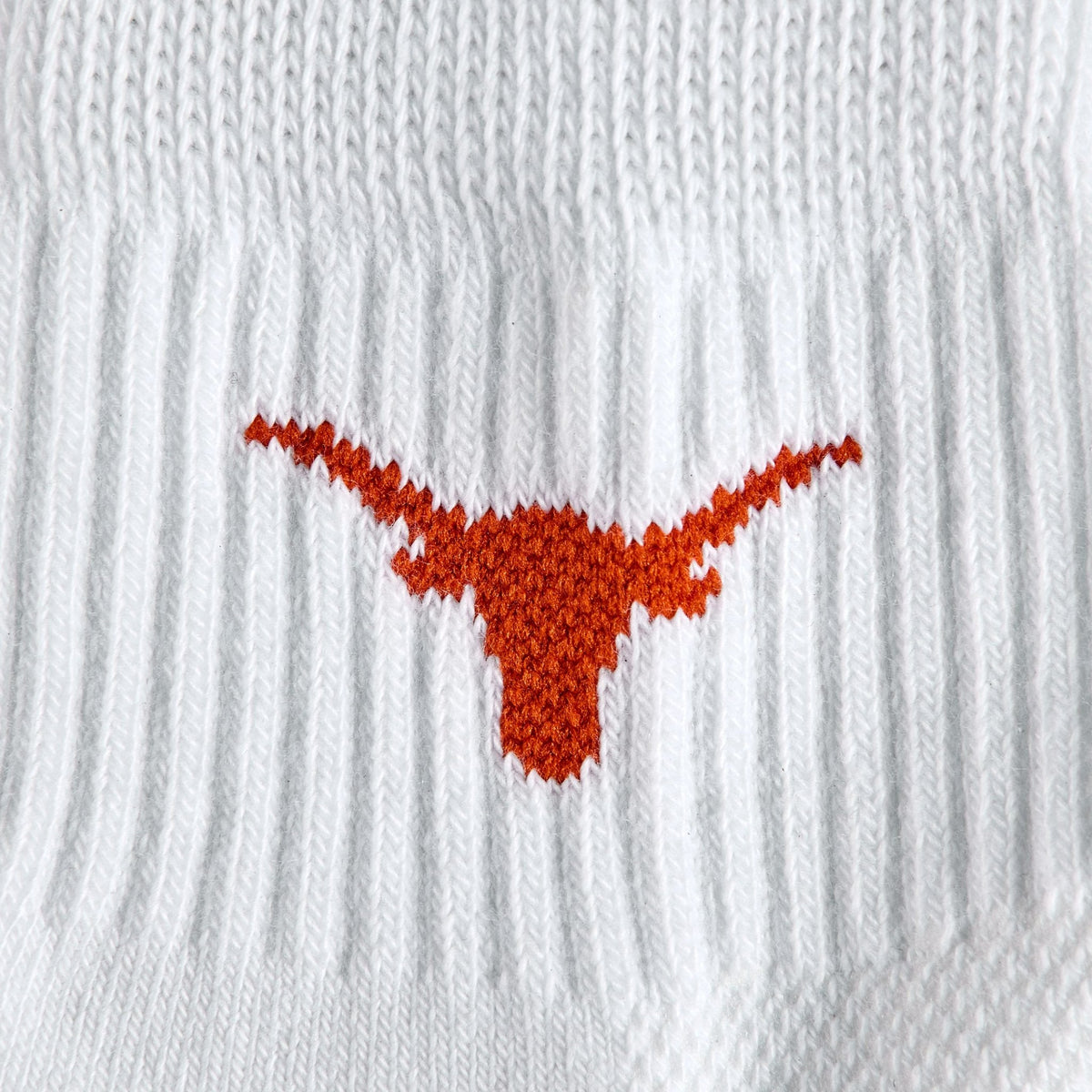 Close-up of the burnt orange Longhorn silhouette on Del Campo Texas Longhorns golf socks