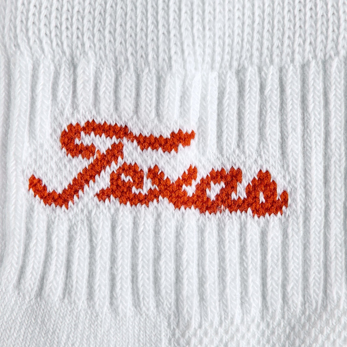 Del Campo Texas Longhorns Script golf socks, embroidered burnt orange Texas script wordmark detail