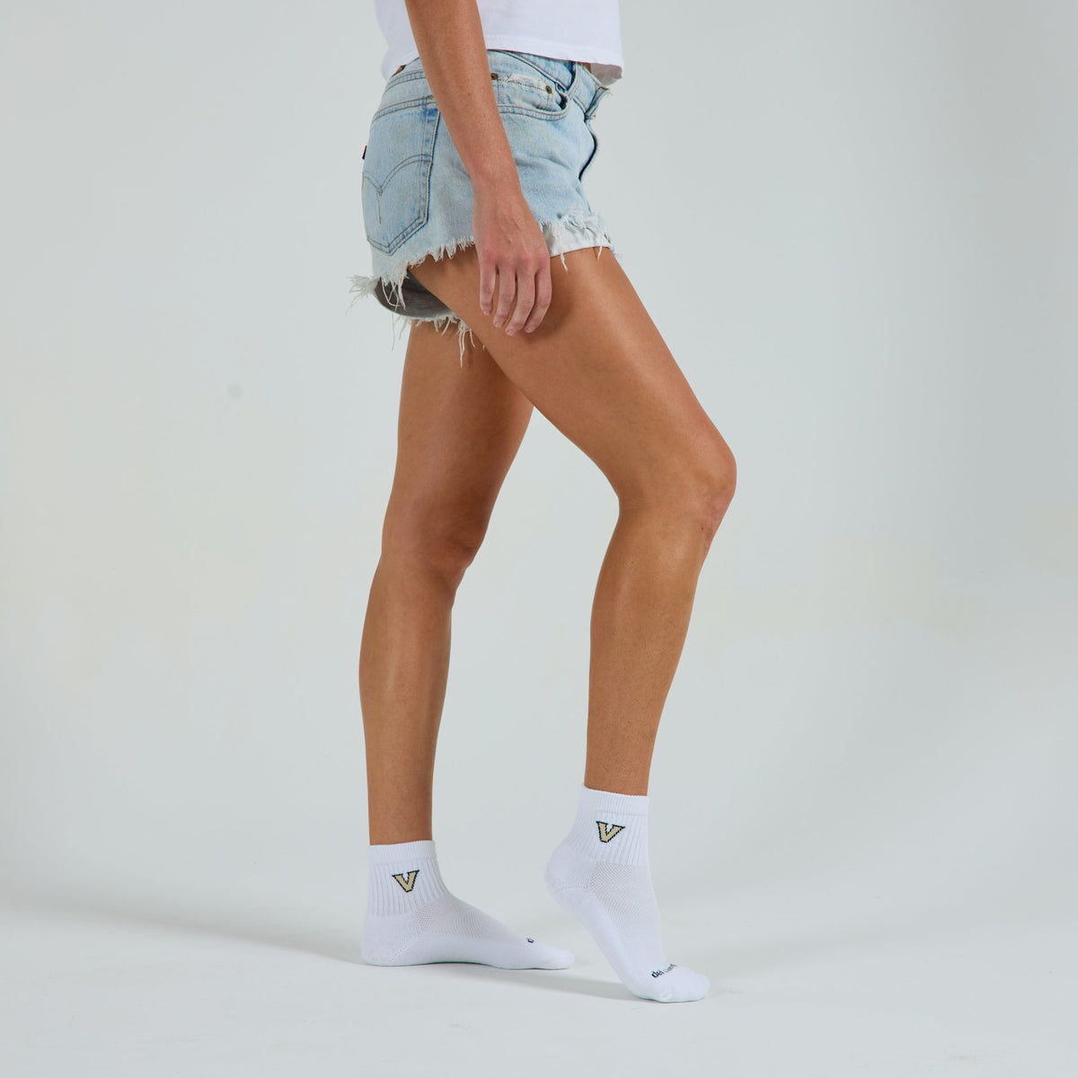 Del Campo Vanderbilt Commodores golf socks on a female model in studio