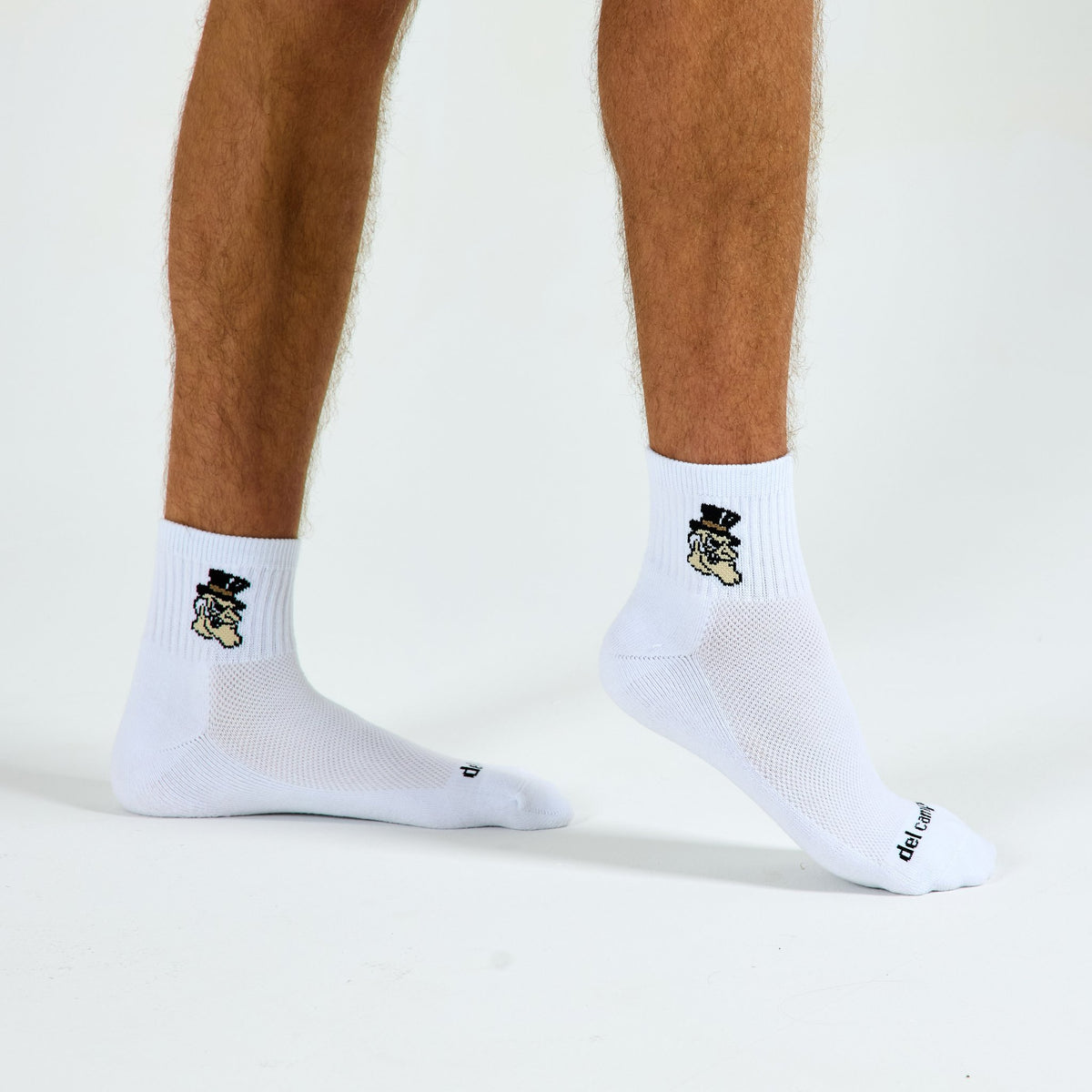 Del Campo Wake Forest Demon Deacons golf socks on a male model in studio