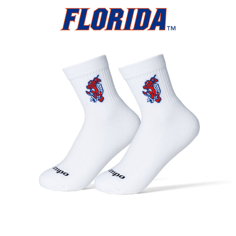 Florida Gators Swinging Gator golf socks in white with red and blue logo on plain background. | product, college
