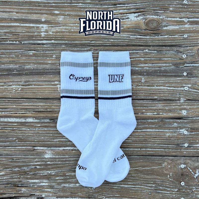 North Florida Ospreys white crew socks with gray stripes and navy band. | product, college