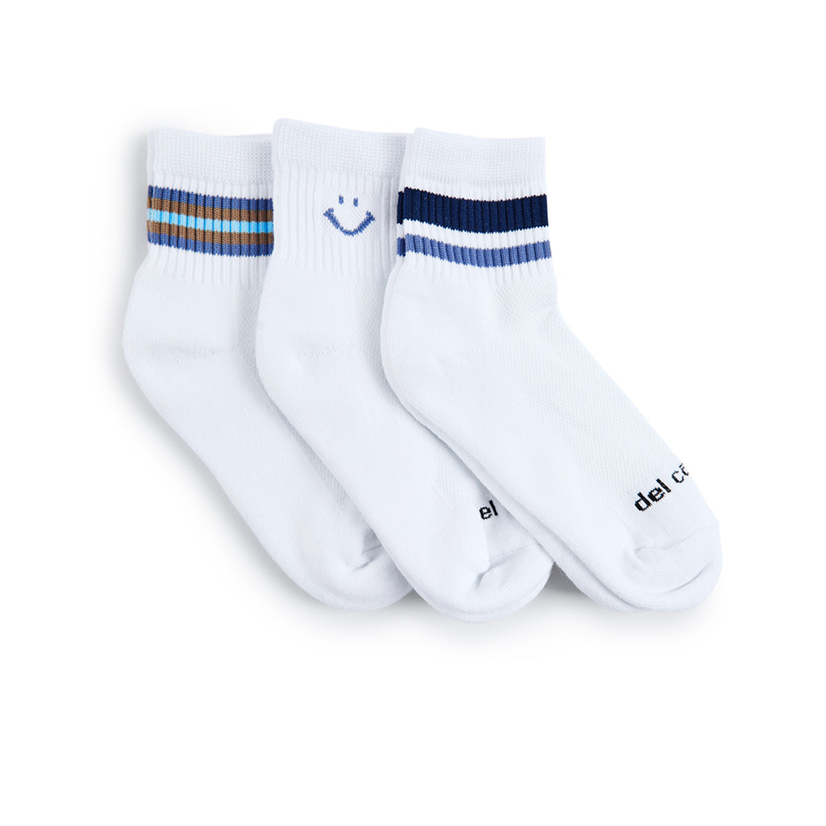 Del Campo Fall Denim Pack golf socks, pack flat lay on grass