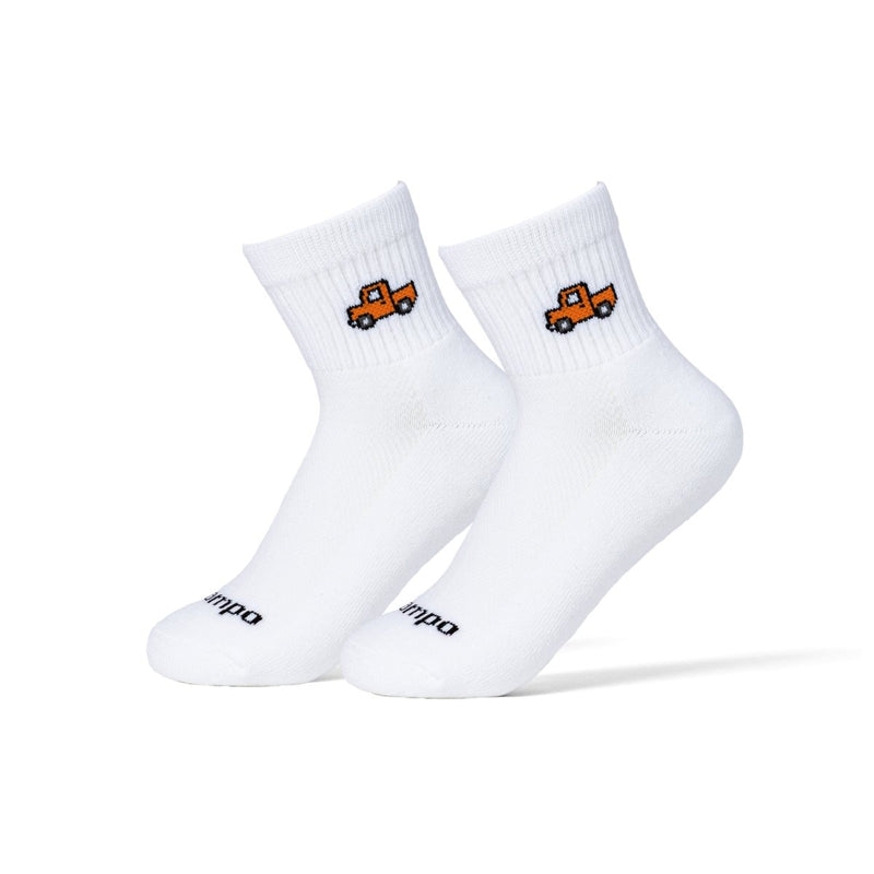 White Del Campo Golf socks with orange truck embroidered design, shown as a pair on white background. | product, kids