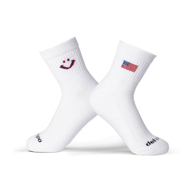 The 1776 white golf socks with patriotic smiley face and American flag embroidery. | product
