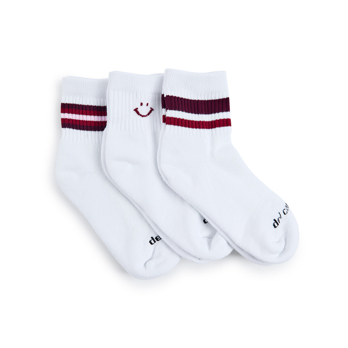 Del Campo Fall Cardinal Pack golf socks, pack flat lay on grass