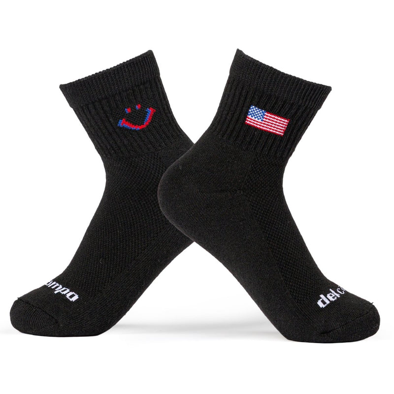 Del Campo Golf The 1776 black socks with red smiley face and American flag embroidery. | product