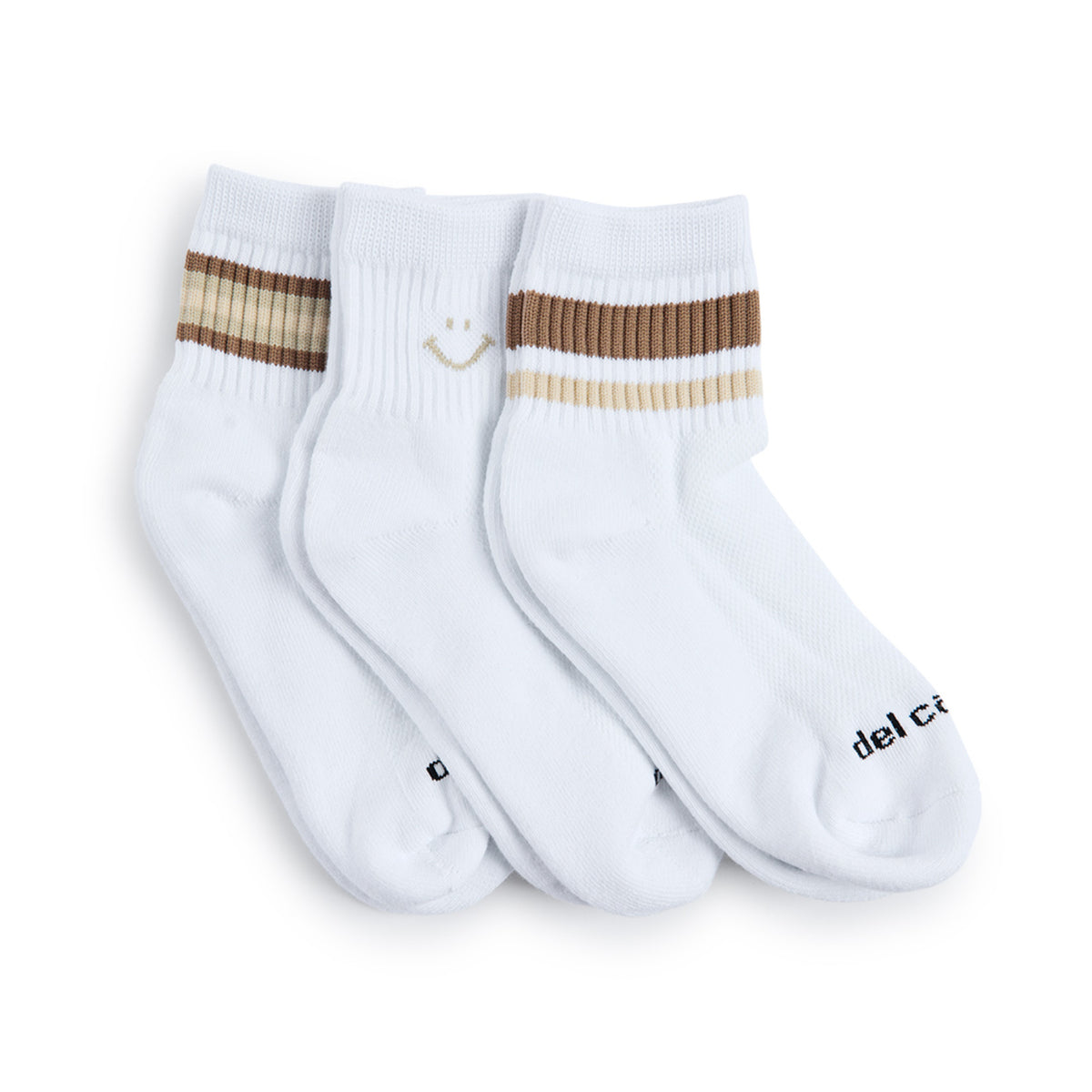 Del Campo Fall Oatmeal Pack golf socks, pack flat lay on grass