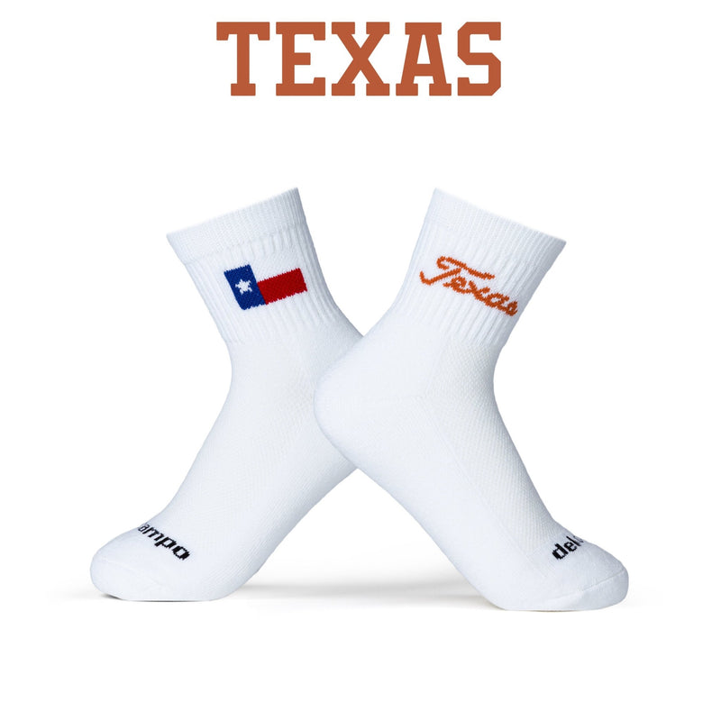 White Del Campo Golf socks with Texas flag and script design on plain background | product, college