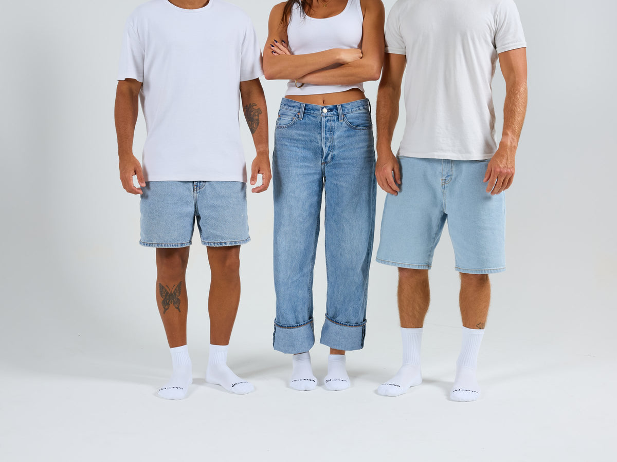 Three people in white Del Campo blank socks: quarter, lowcut and crew