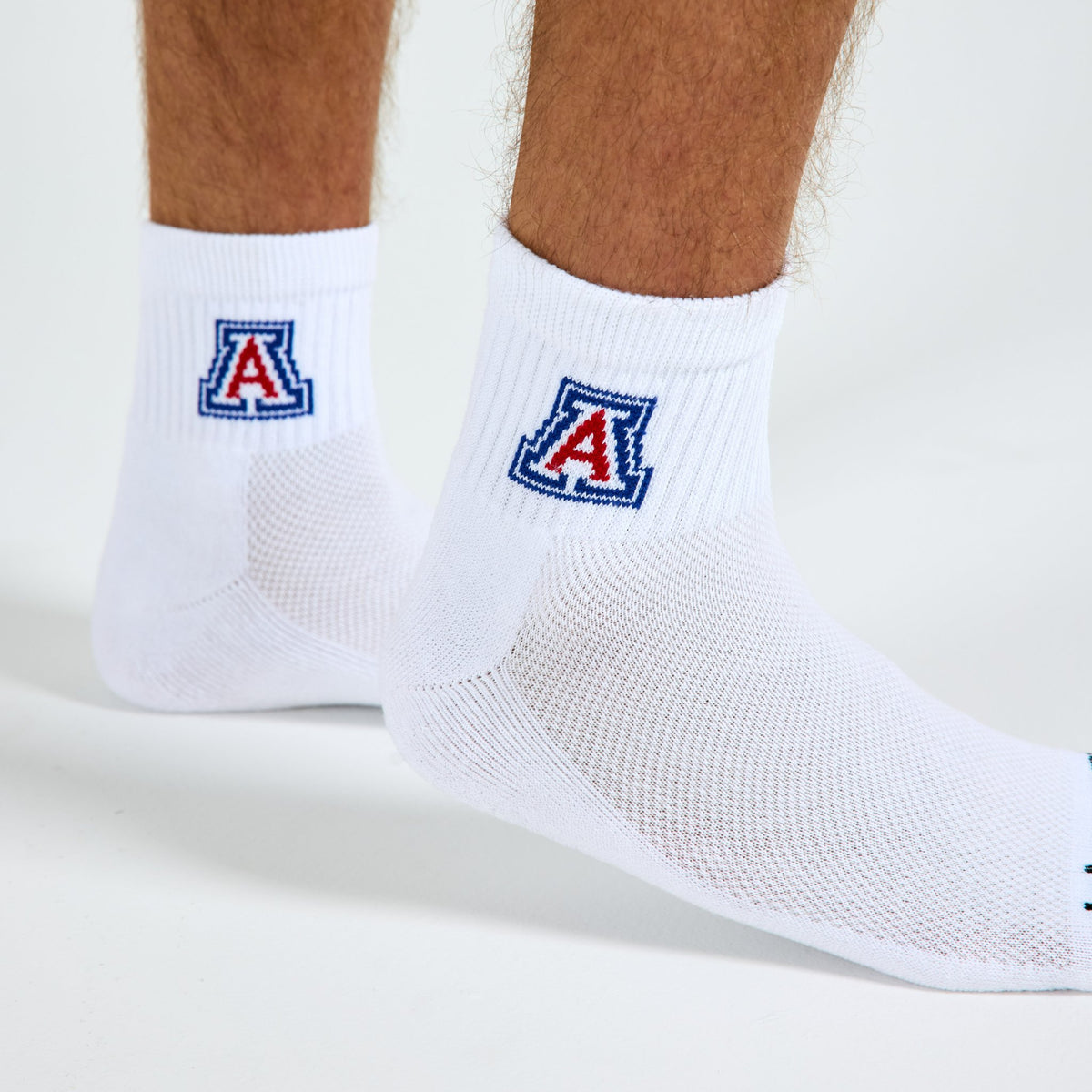 Close-up of the red block A on Del Campo Arizona Wildcats golf socks