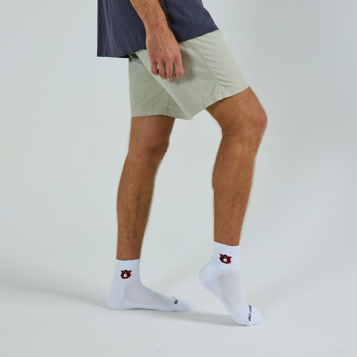 Del Campo Auburn War Eagle golf socks on a male model in studio