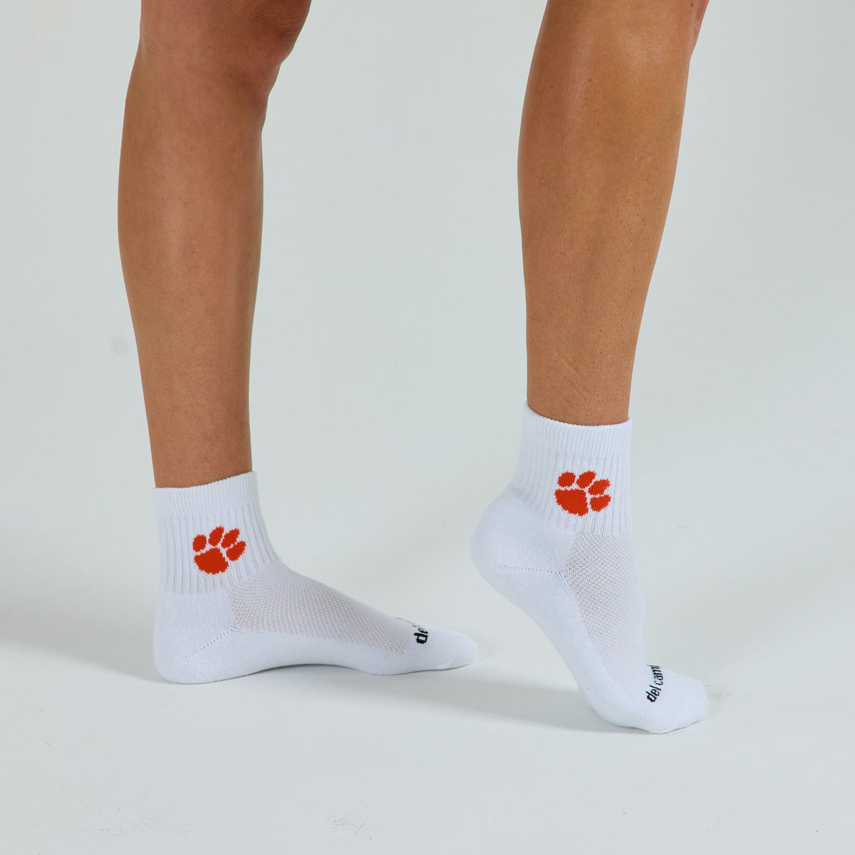 Man wearing Del Campo Clemson Tigers golf socks, studio shot, no shoes