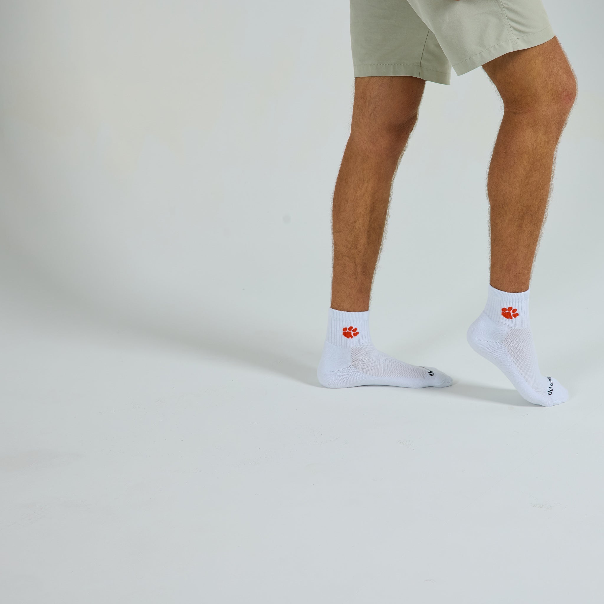 Del Campo Clemson Tigers golf socks on a male model in studio