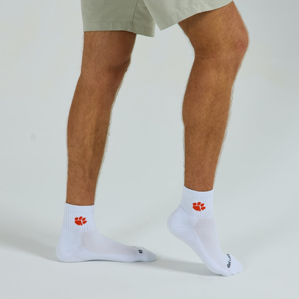 Del Campo Clemson Tigers golf socks on a male model in studio
