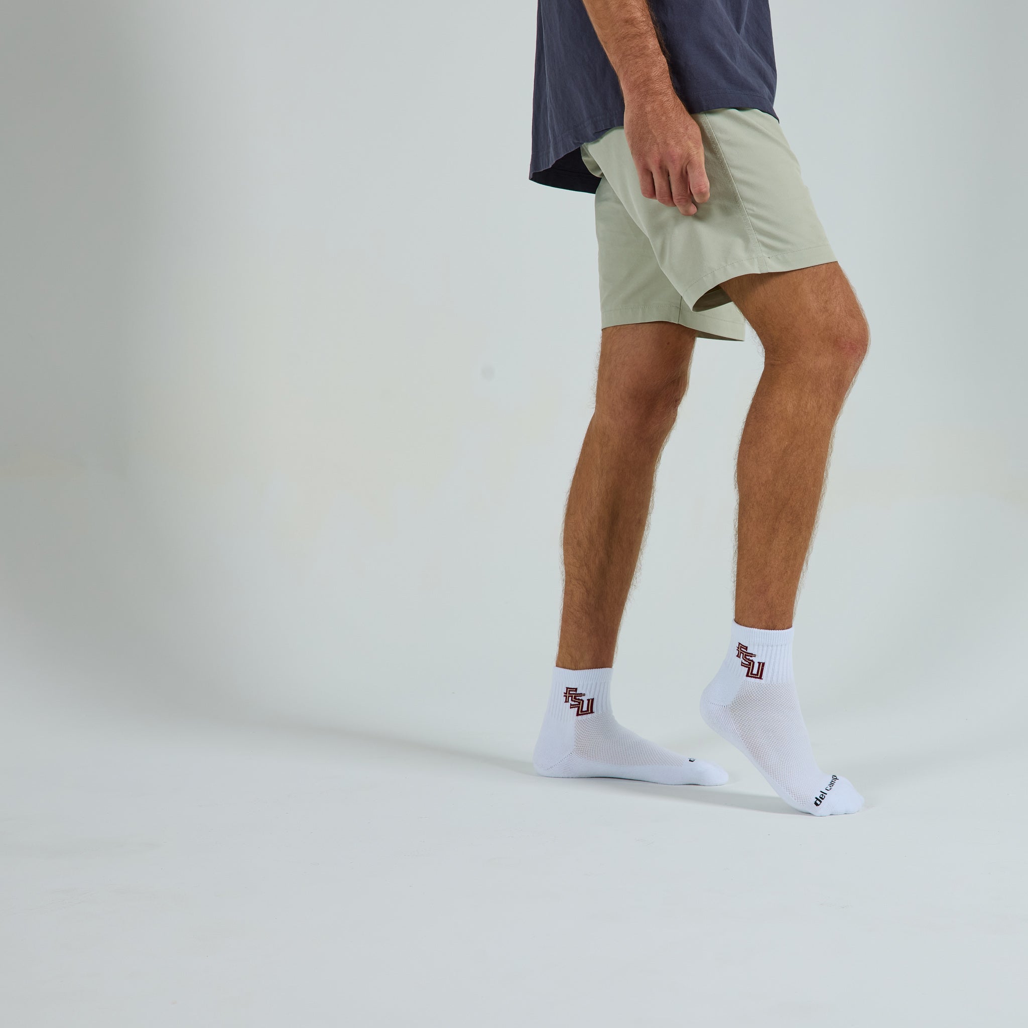 Del Campo Florida State Script golf socks on a male model in studio