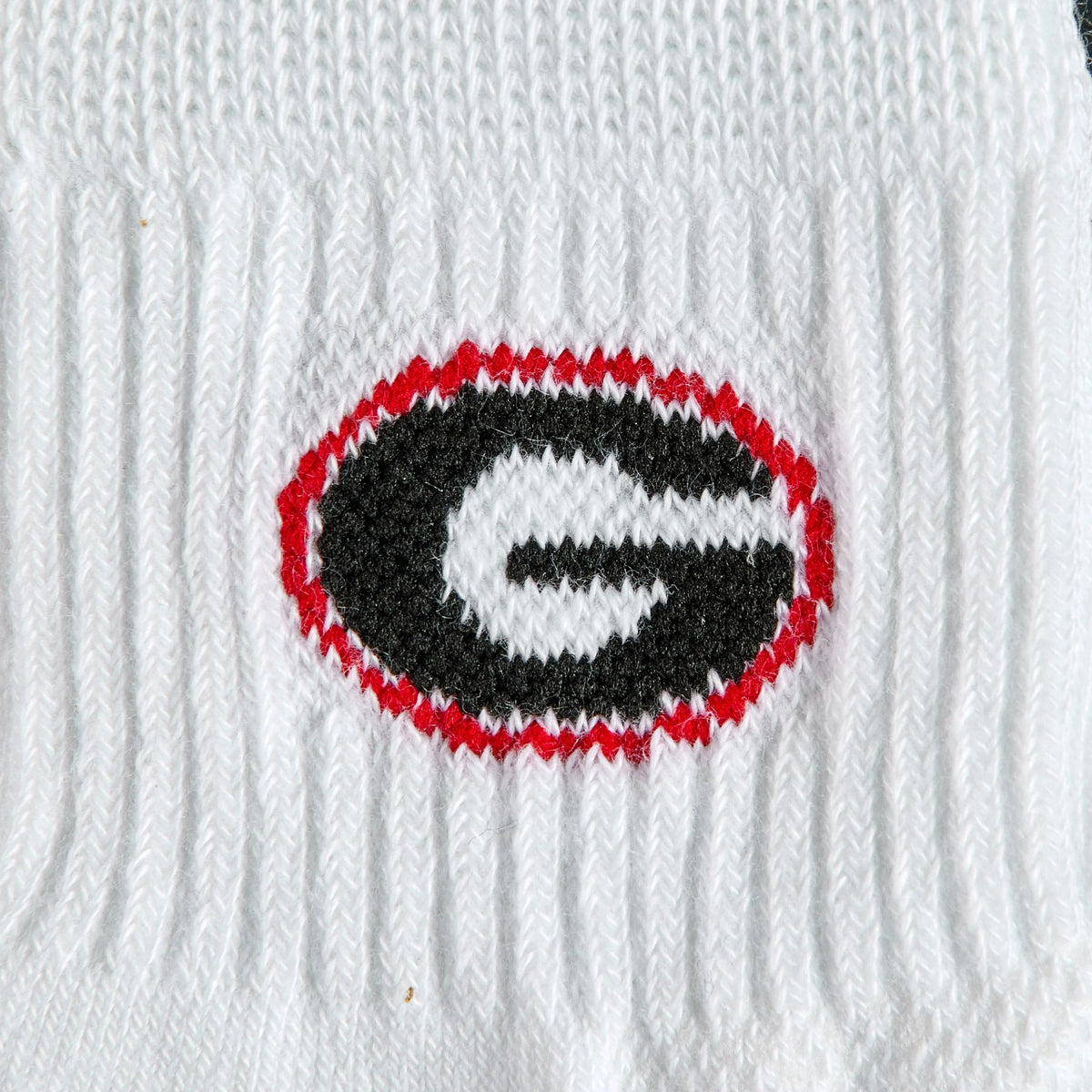Close-up of the black G in a red oval on Del Campo Georgia Bulldogs golf socks