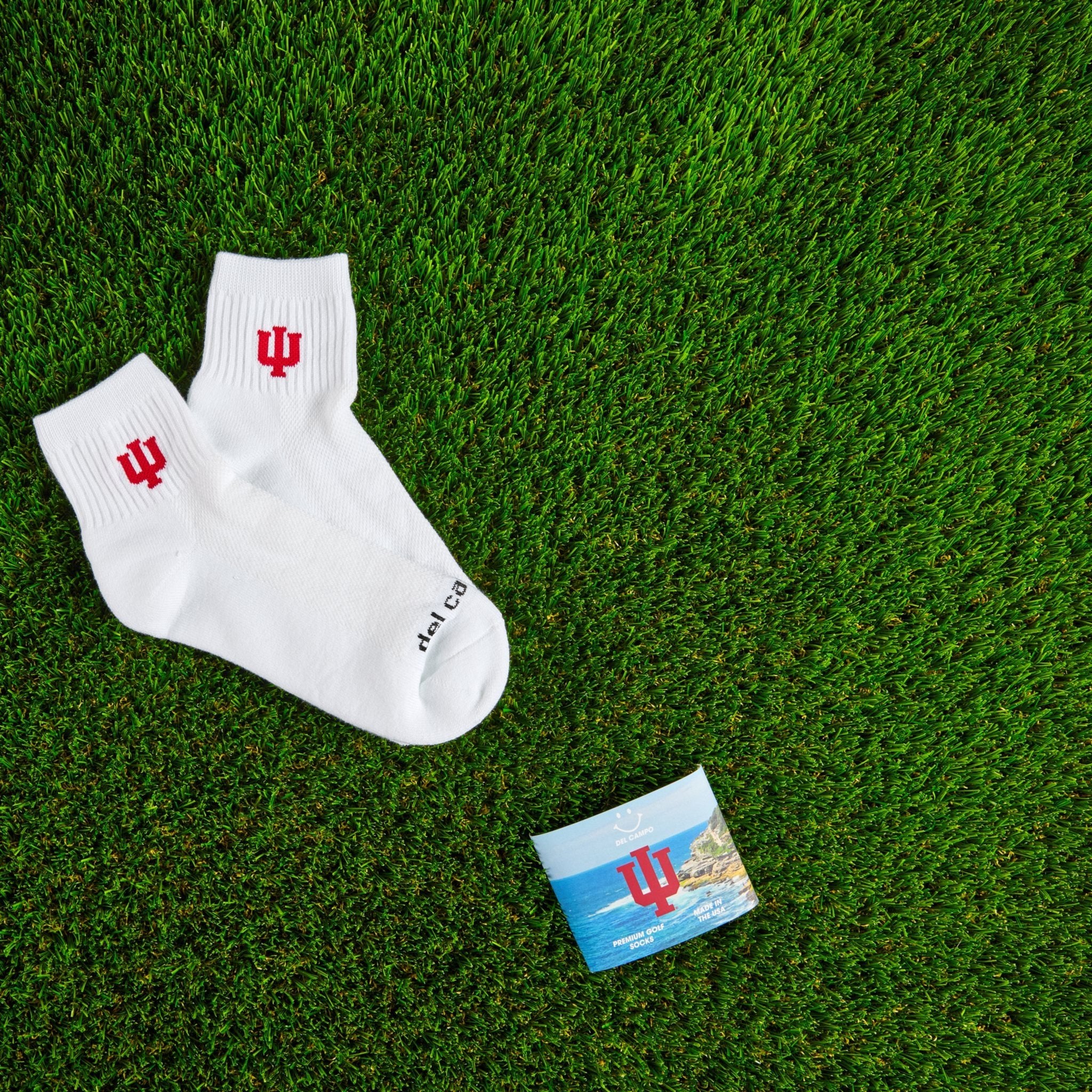 Del Campo Indiana Hoosiers golf socks on turf with a team pennant