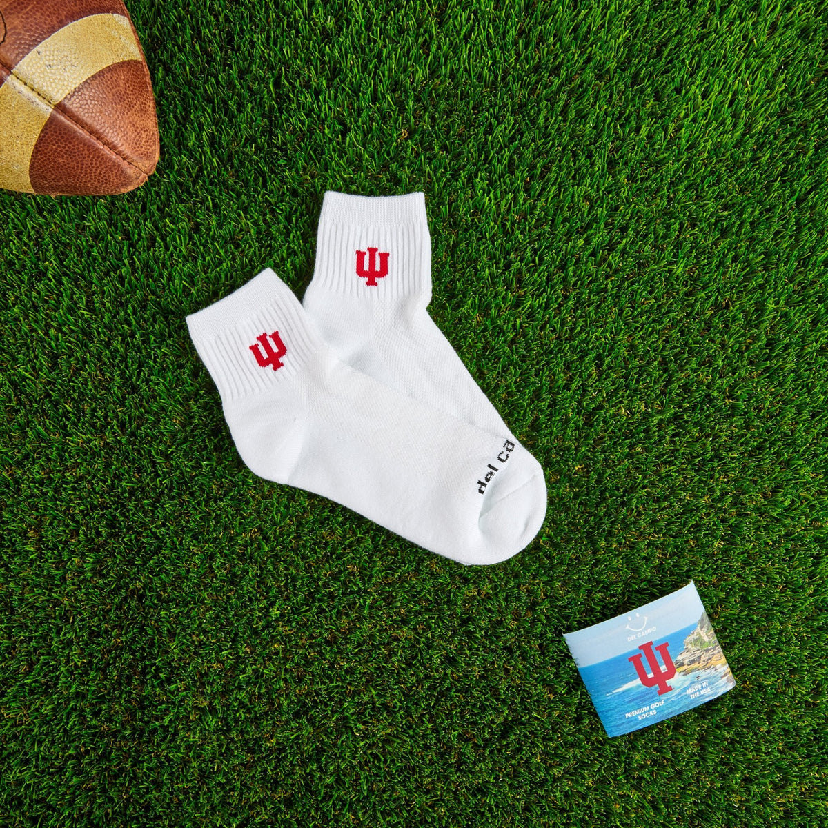 Del Campo Indiana Hoosiers golf socks on turf with a team pennant