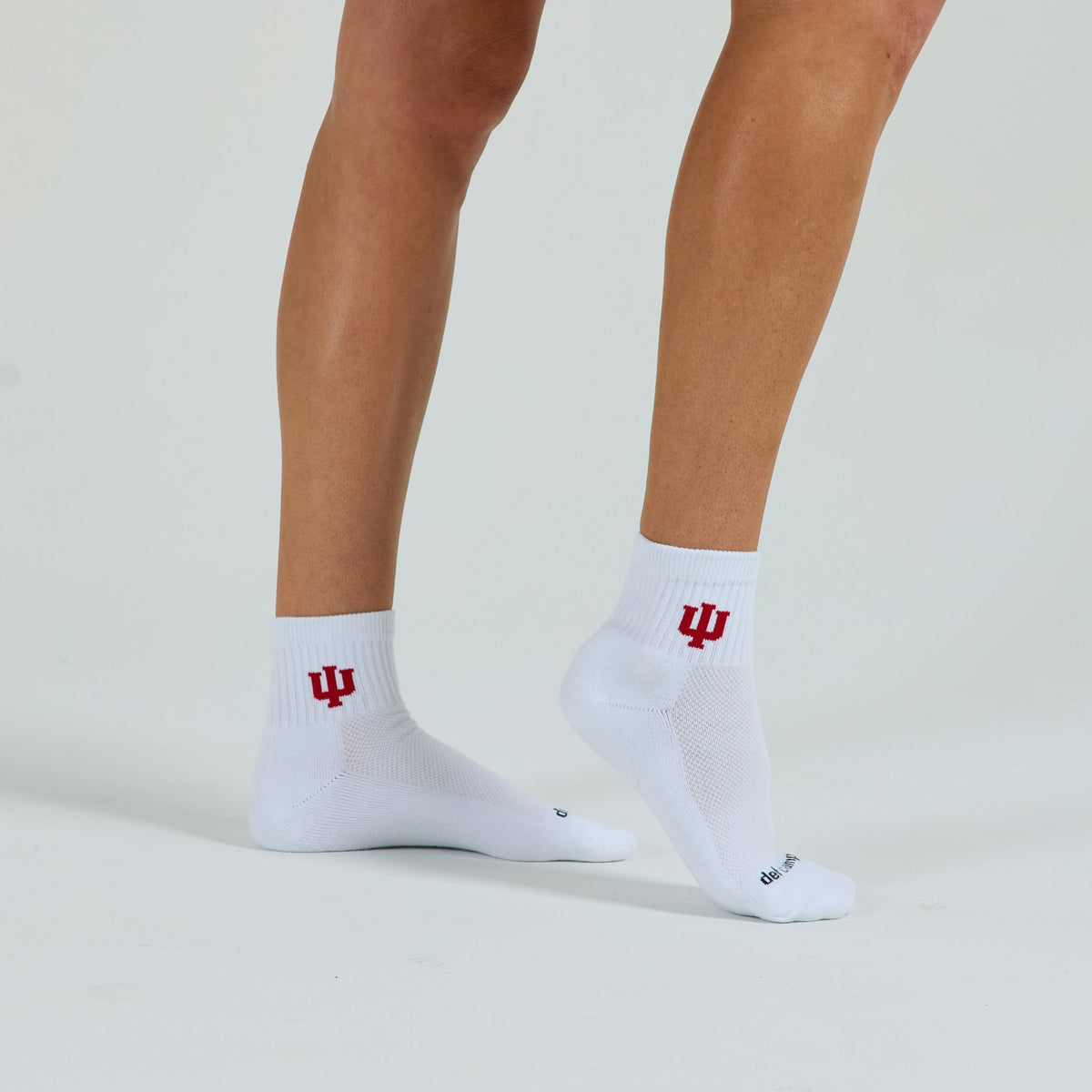 Man wearing Del Campo Indiana Hoosiers golf socks, studio shot, no shoes