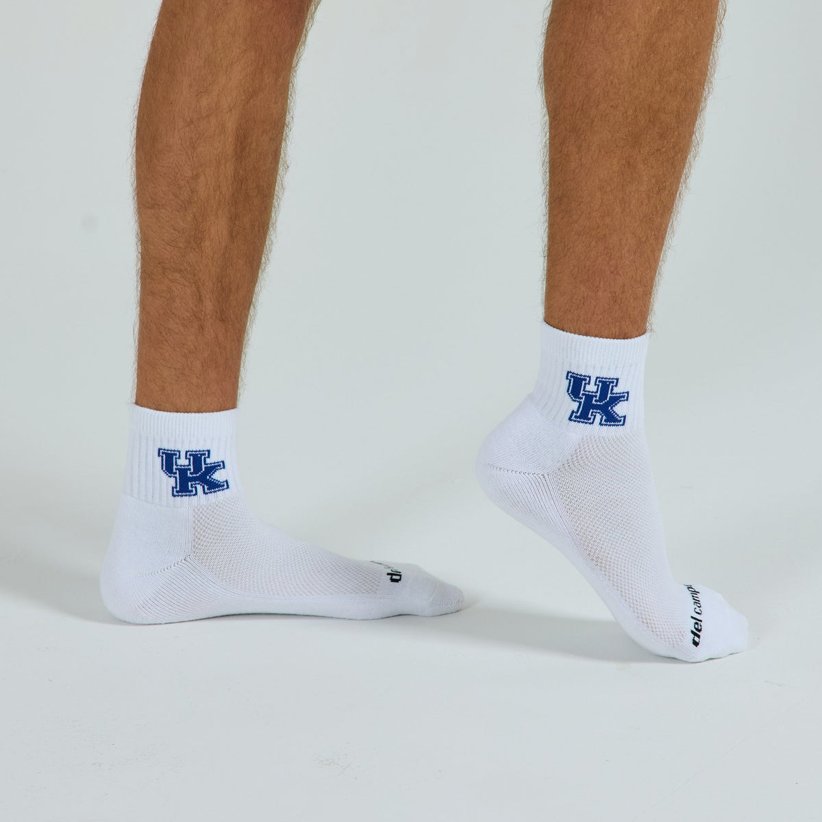 Del Campo Kentucky Wildcats golf socks on a male model in studio