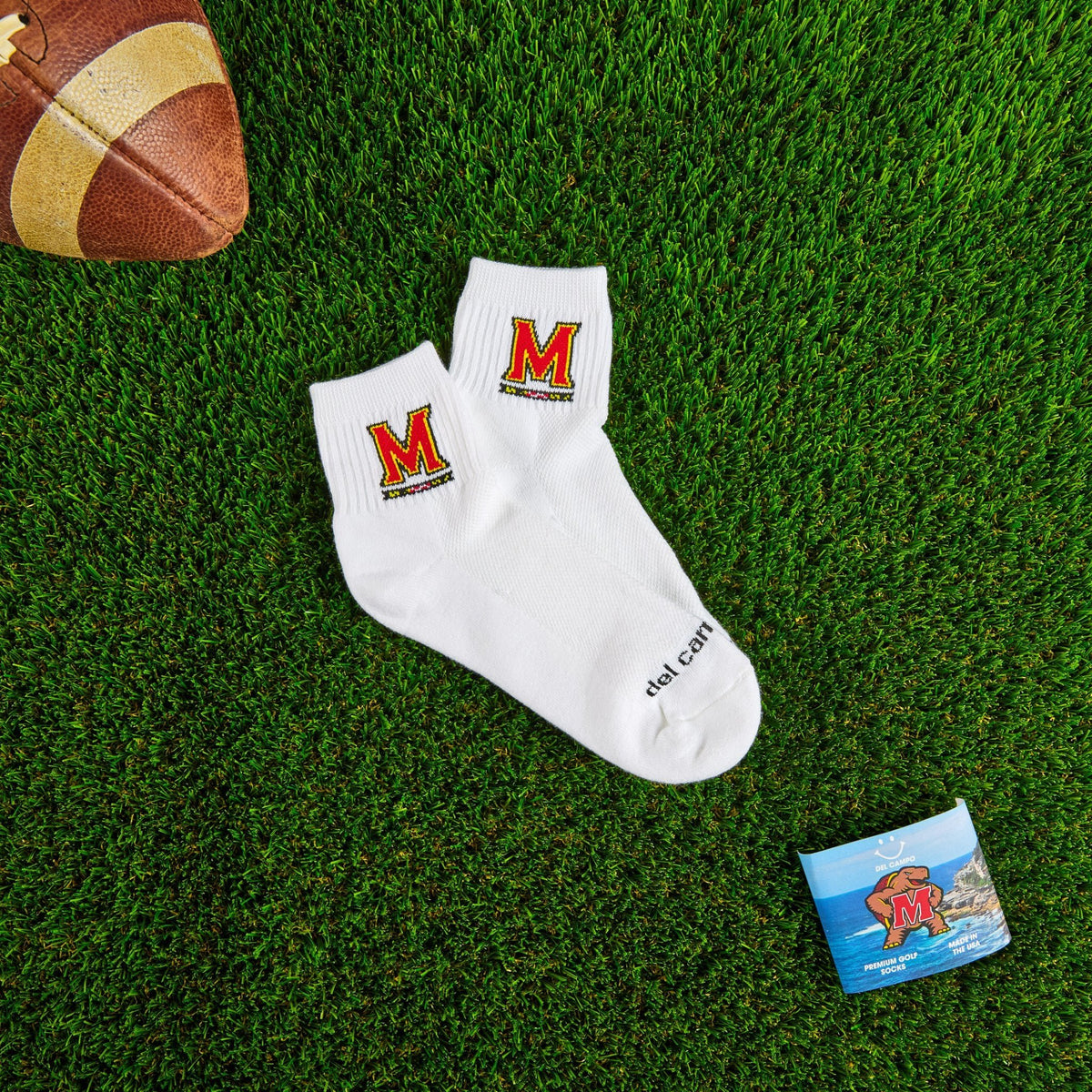 Del Campo Maryland Terrapins golf socks on turf with a team pennant