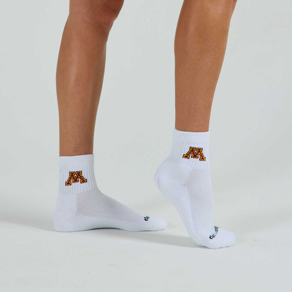 Del Campo Minnesota Golden Gophers golf socks on a female model in studio