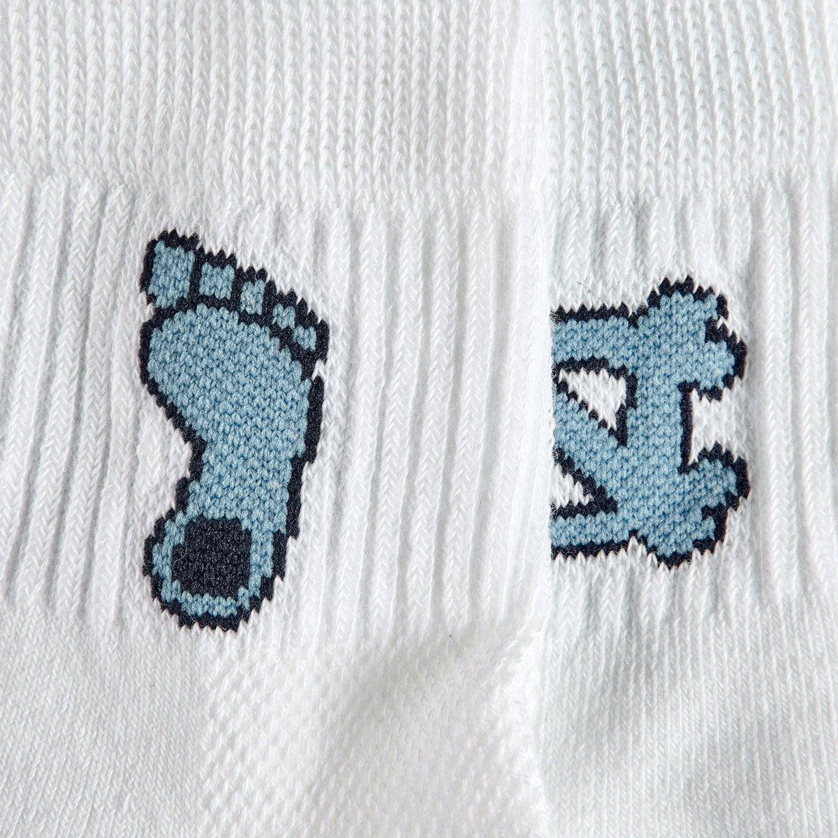 Close-up of the Tar Heel footprint on Del Campo North Carolina Pack golf socks