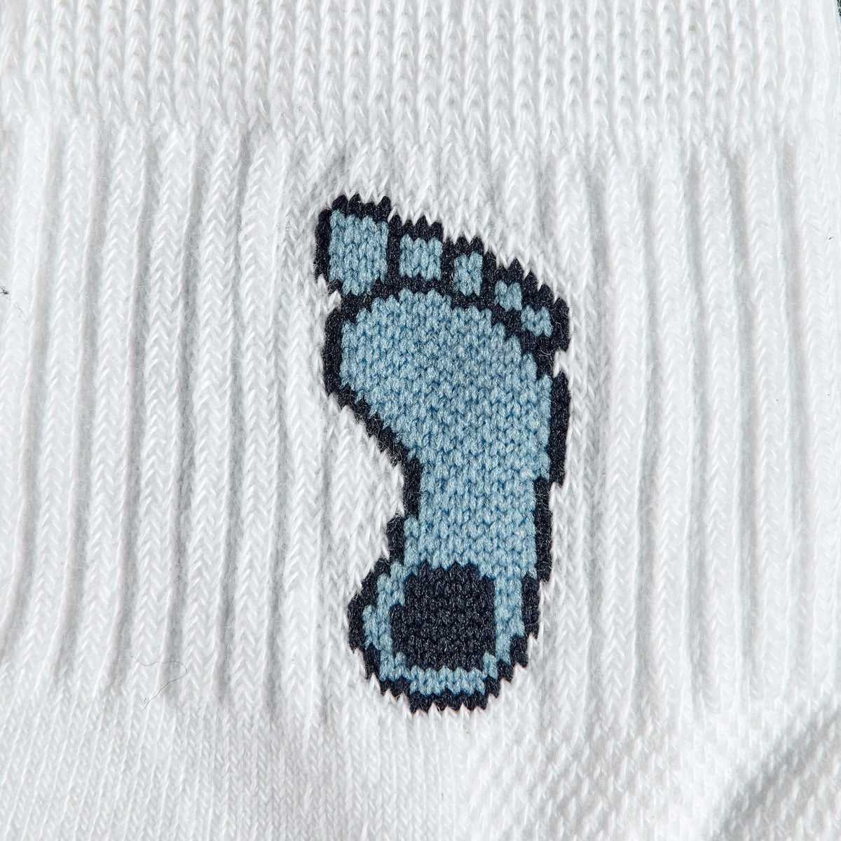 Close-up of the Tar Heel footprint on Del Campo North Carolina Tar Heel golf socks