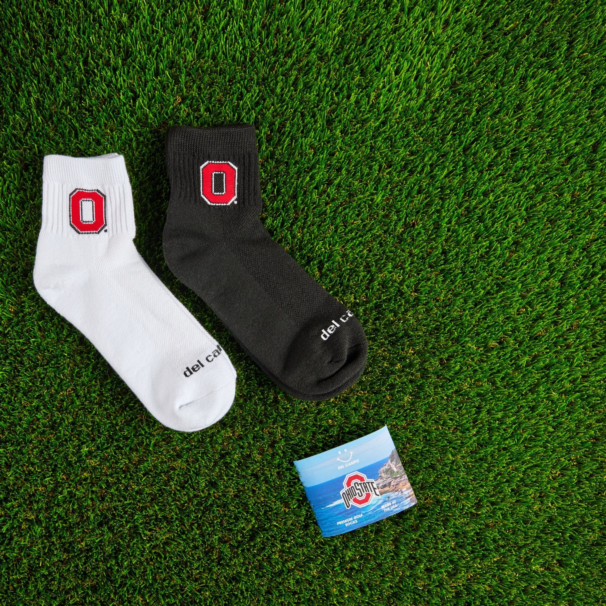Del Campo Ohio State Pack golf socks on turf with a team pennant