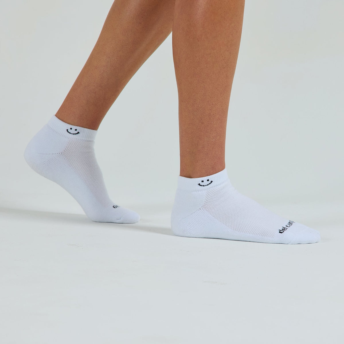 Smiley Lowcut Socks worn barefoot, side view - del campo