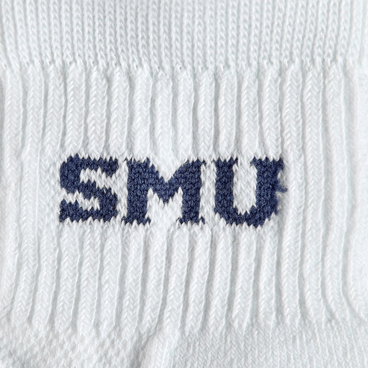 Close-up of the navy SMU wordmark on Del Campo SMU Mustangs golf socks