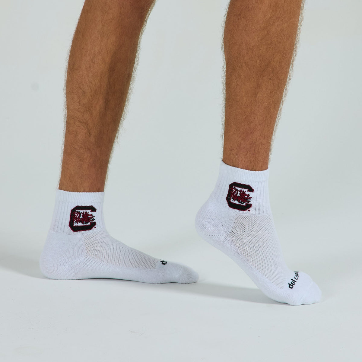 Del Campo South Carolina Gamecocks golf socks on a male model in studio