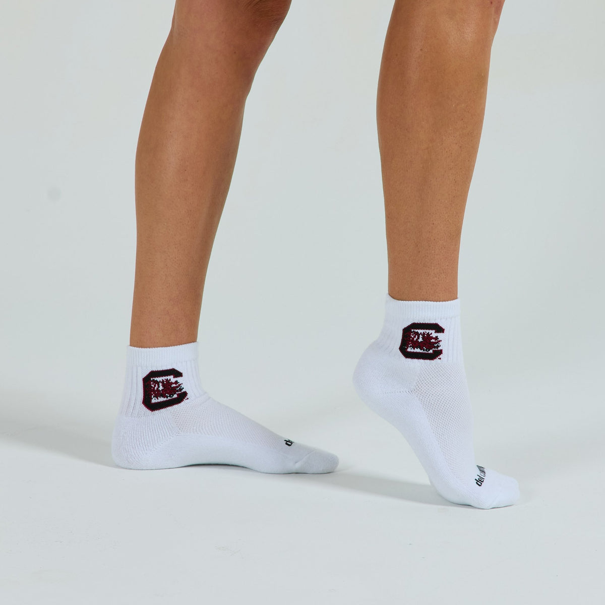 Del Campo South Carolina Gamecocks golf socks on a female model in studio