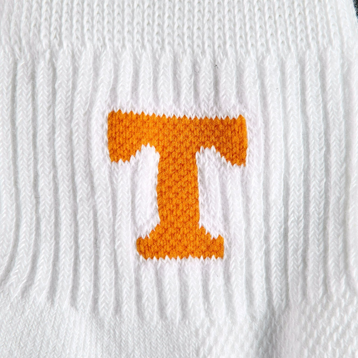 Close-up of the orange Power T on Del Campo Tennessee Block T golf socks