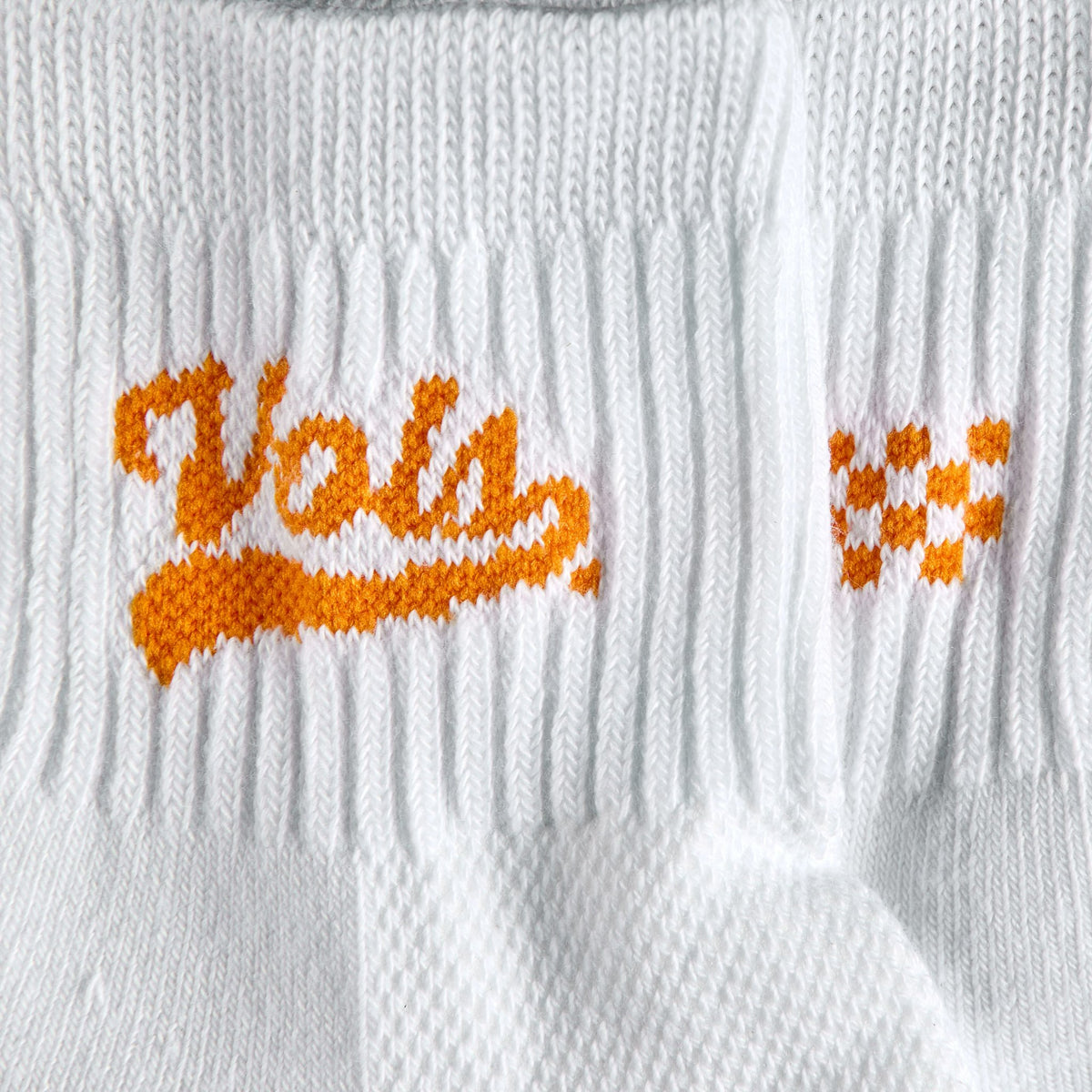 Close-up of the Vols script wordmark on Del Campo Tennessee Script golf socks