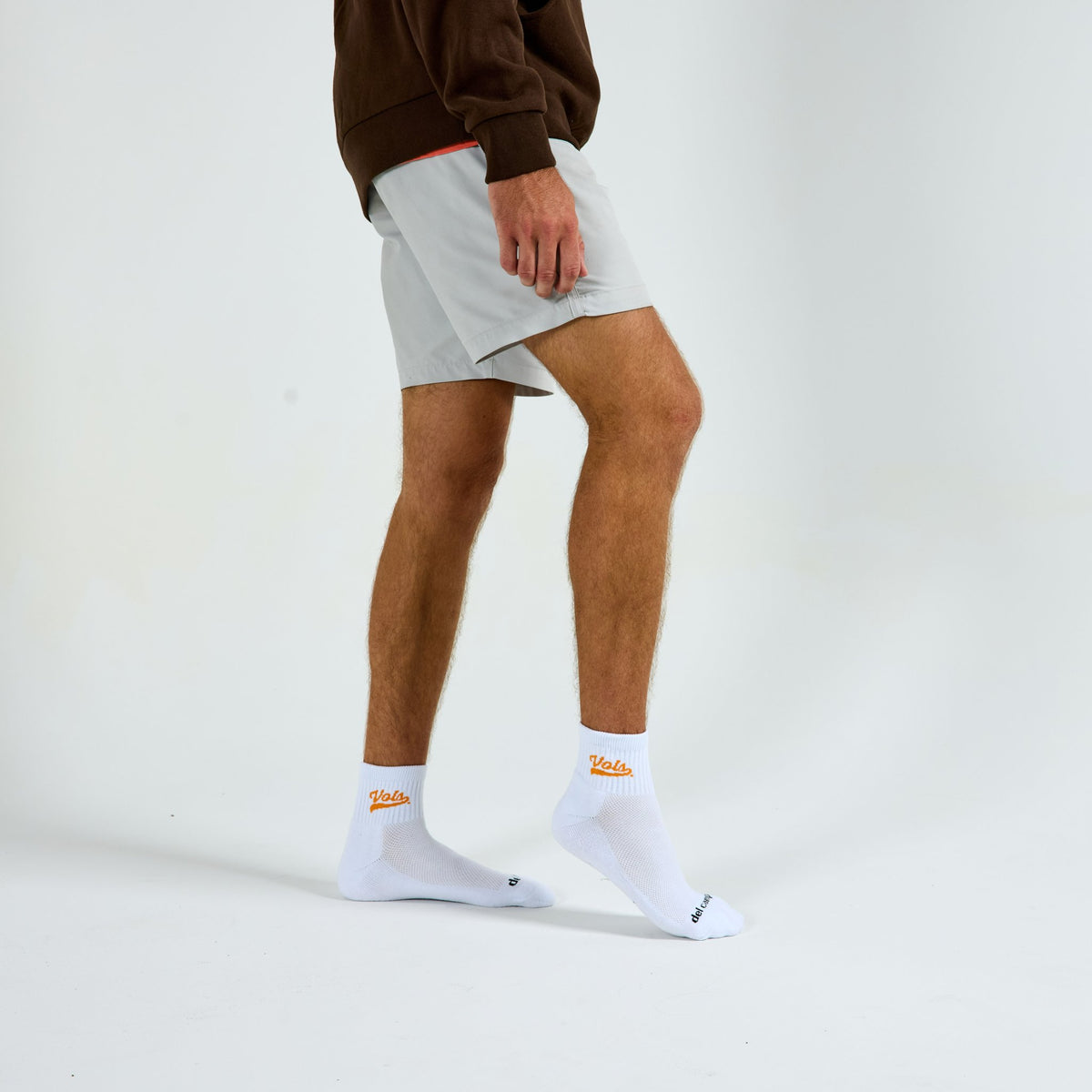 Del Campo Tennessee Script golf socks on a male model in studio