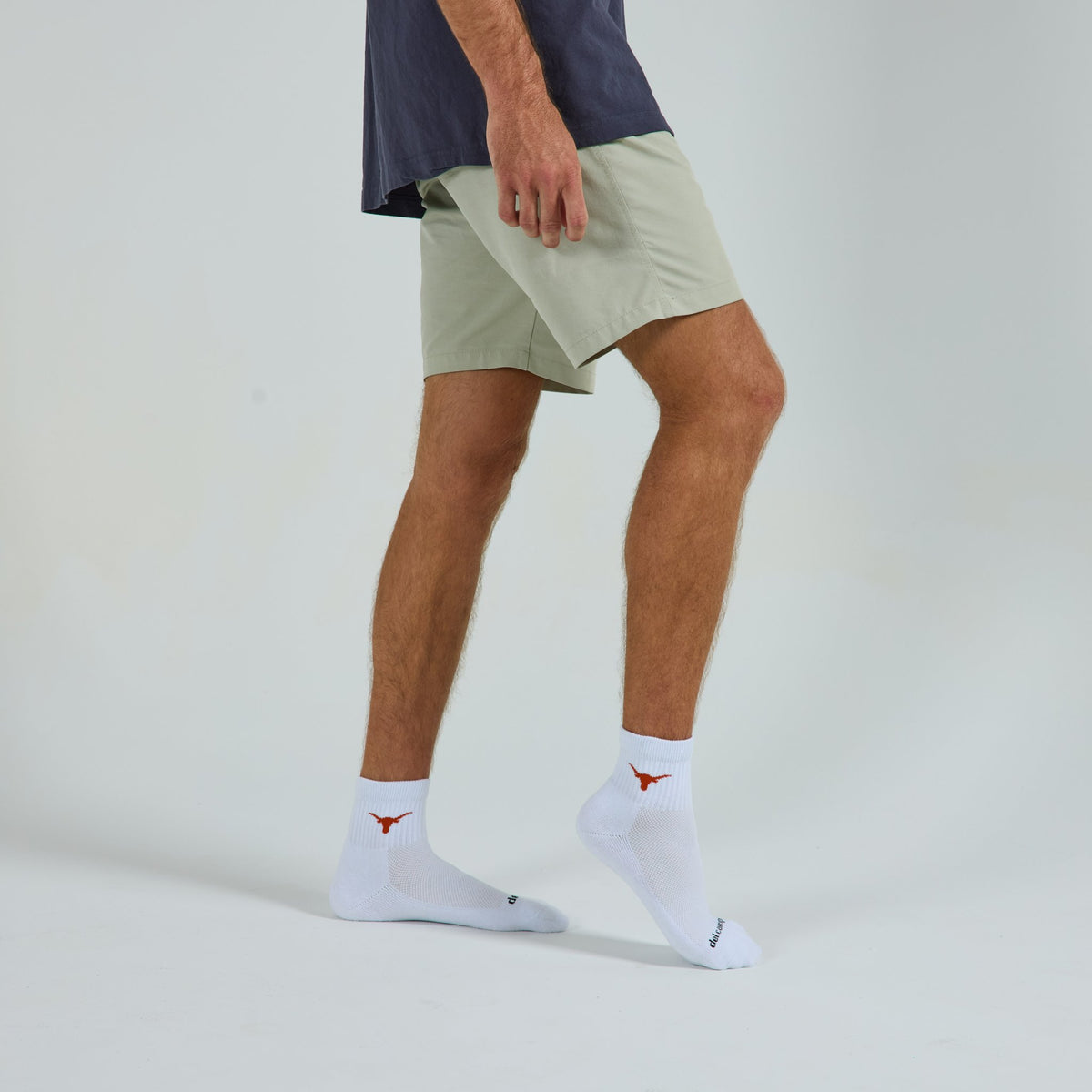 Del Campo Texas Longhorns golf socks on a male model in studio